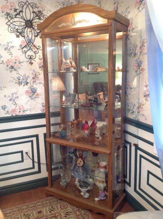 #114 Glass Display Cabinet ( Lighted/ 4 Glass doors / 3 adjustable glass shelves) W32.5XD14XH76  $158