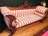 Beautiful antique couch measures 7 1/2 feet long, 2 feet deep, Arms measure 34" tall, back carved wood detail measures 46" tall. An exquisite piece in excellent condition!