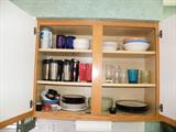 Just some of the kitchenware, items to be added as we set-up. We'll be adding dishes, small appliances, pots and more!