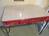Excellent enamel top kitchen table.