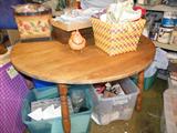 Another nice kitchen table, sturdy maple, on and around are crafting supplies!