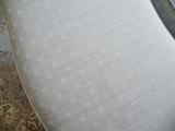 Fabric detail on Bergere chairs and ottoman.