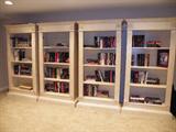4 Classic wooden bookcases in antique white. Each measures: 33" Wide, 71" High, 14" Deep and has 4 shelves. Books are also for sale. This is just a small selection of the books available at the sale!