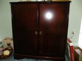 Very nice dark wood TV cabinet. CRT TV is also for sale!