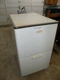 Vintage Duratub laundry tub with cabinet underneath.