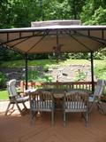 Kingston Gate teak look outdoor patio set. The wood is Eucalyptus wood