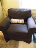 Mitchel Gold and Bob Williams chocolate slip covered arm chair. Fabric underneath is white muslin.