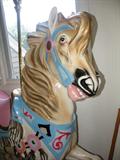 Life size carousel horse. Yes it will support the weight of an adult. No you cannot climb on it, because it is not secured to anything.