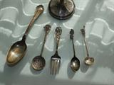 Close-up of sterling silver spoons.