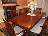The never-used dining room set. Beautiful inlay detail.