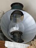 A true antique! Great oil lamp with reflector.