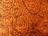 Close-up swatch of couch fabric. Note: fabric is not as orange as this picture shows. Full view of couch is more true to color.