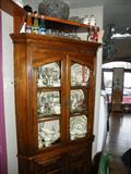 Oak corner cabinet goes with dining room table. Can be sold separately.