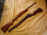 Marlin Firearms Co. Glenfield Mod. 25 22 caliber rifle and Crosman Arms pump action circa 1940