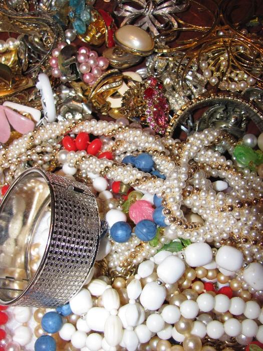 Vintage and newer costume jewelry.  Trifari, Christian Dior earrings, and other brand names.