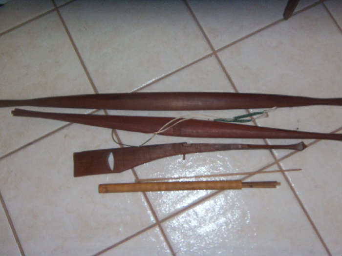 Cross bow and handmade arrows taken from North Vietnamese prisoner.