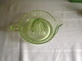 Reamer in green glass -- lime juice looks clear.