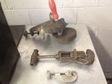 Bench grinder and pipe cutters