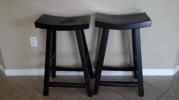 Saddle style bar stools