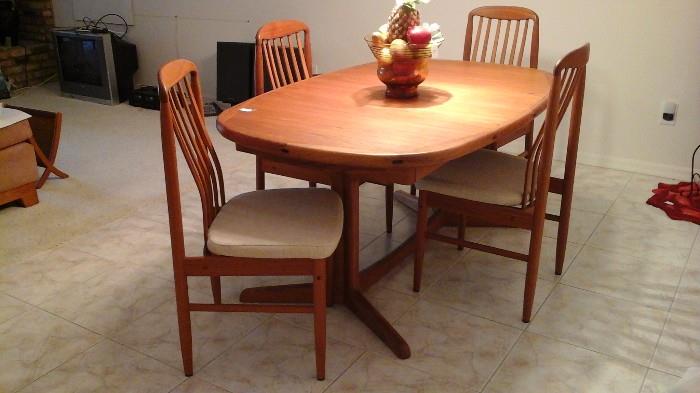 Just Added!!!  Teakwood dining table with one leaf and 4 chairs.  Pristine Condition!