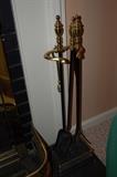 brass fireplace fender and tools