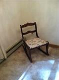 Antique child's rocker -- has been in the family for at least three generations.