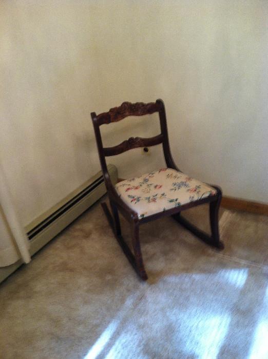 Antique child's rocker -- has been in the family for at least three generations.