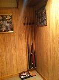 Pool cues and accessories.
