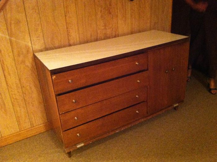 Four-drawer buffet with cabinet.