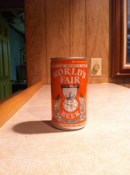 There are 12 of these unopened World's Fair Beer cans.
