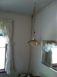 Hanging lamp and mirror.