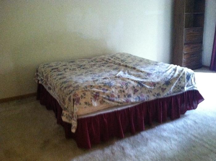 King size bed, with two twin mattresses and box spring.