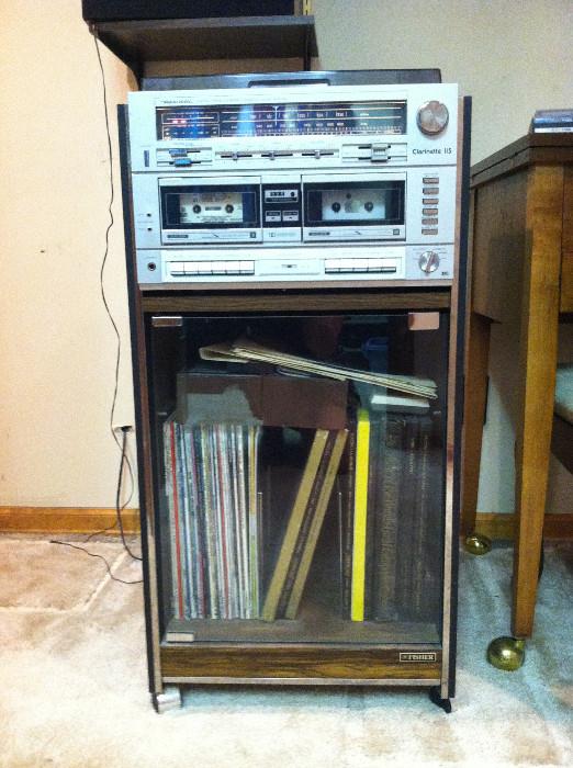 Working Realistic dual-cassette-phono stereo with cabinet. The record player has a perfect working stylus. Has phenomenal sound.