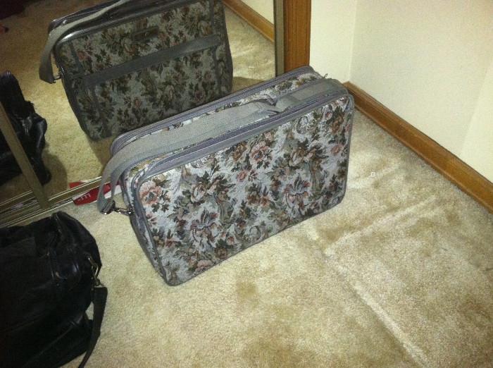 Tapestry suitcase.