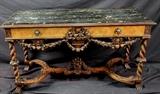 antique marble top table with elaborately carved decoration 