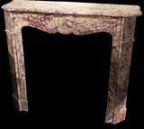 carved rose marble fireplace surround 