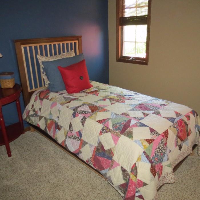 pair of twin beds, beautiful quilts