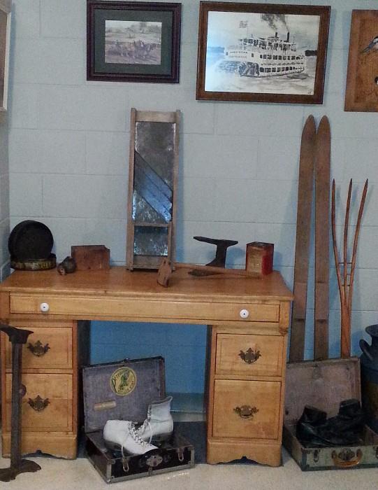 Beautiful pine desk surrounded  by primitives