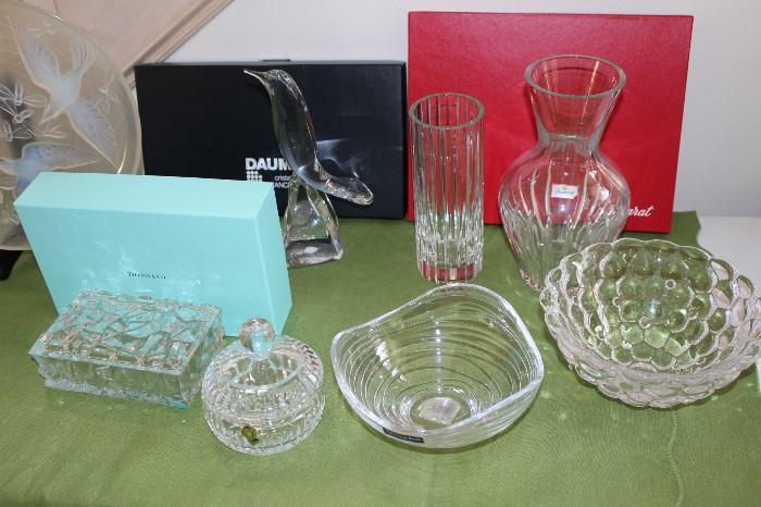 Tiffany, Orrefors, Waterford, Daum and Baccarat.