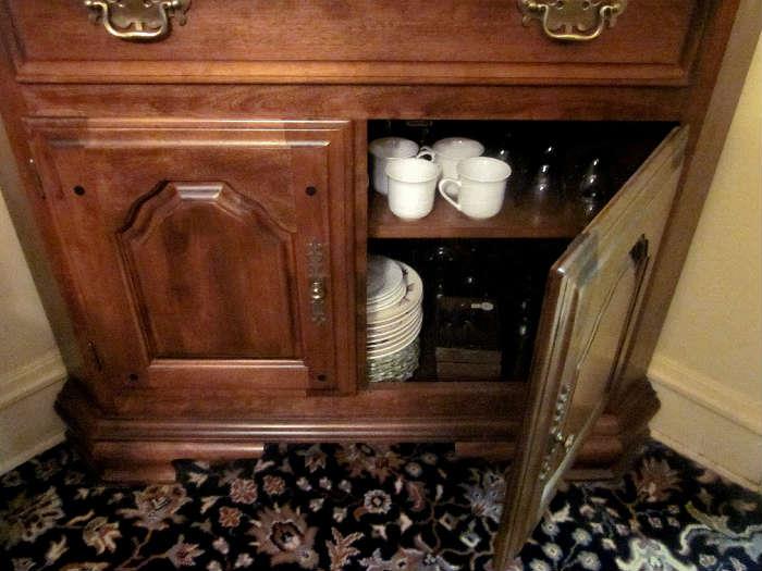 Solid Rock Maple, high quality, corner china cabinet by Temple-Stuart.  Lighted interior, glass shelves, brass hardware.  Doors have convex glass.  Storage for china, crystal, display, etc.