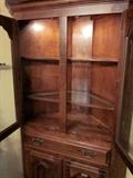 Solid Rock Maple, high quality, corner china cabinet by Temple-Stuart.  Lighted interior, glass shelves, brass hardware.  Doors have convex glass.  Storage for china, crystal, display, etc.