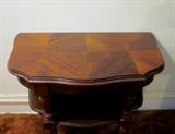 Vintage wood 1/2-table with one shelf and inlaid top.