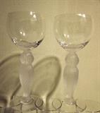 Pair of crystal wine glasses with frosted owl figural stems.