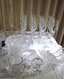 Crystal champagne flutes, Orrefors crystal leaf bowl, Cut crystal serving bowl, Oleg Cassini crystal candle holder, vintage cut crystal creamer and sugar bowl.
