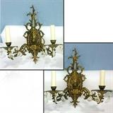 pr of brass ornate and prism draped two lite wall sconces