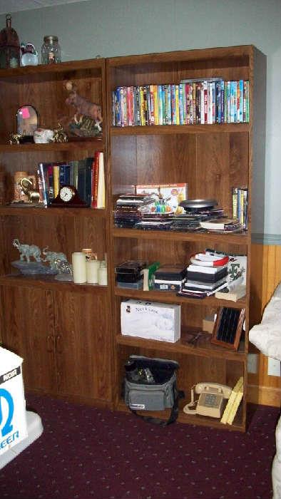 bookcases, dvds, old phone, cds