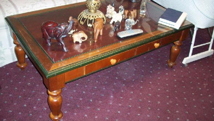 coffee table with drawer, lots more elephants than pictured