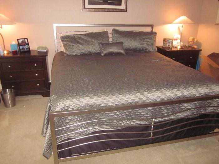 King bed, End tables, comforter, lamps