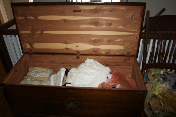 Trunk filled with antique clothing