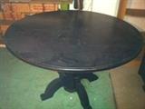 60" round carved dark oak table